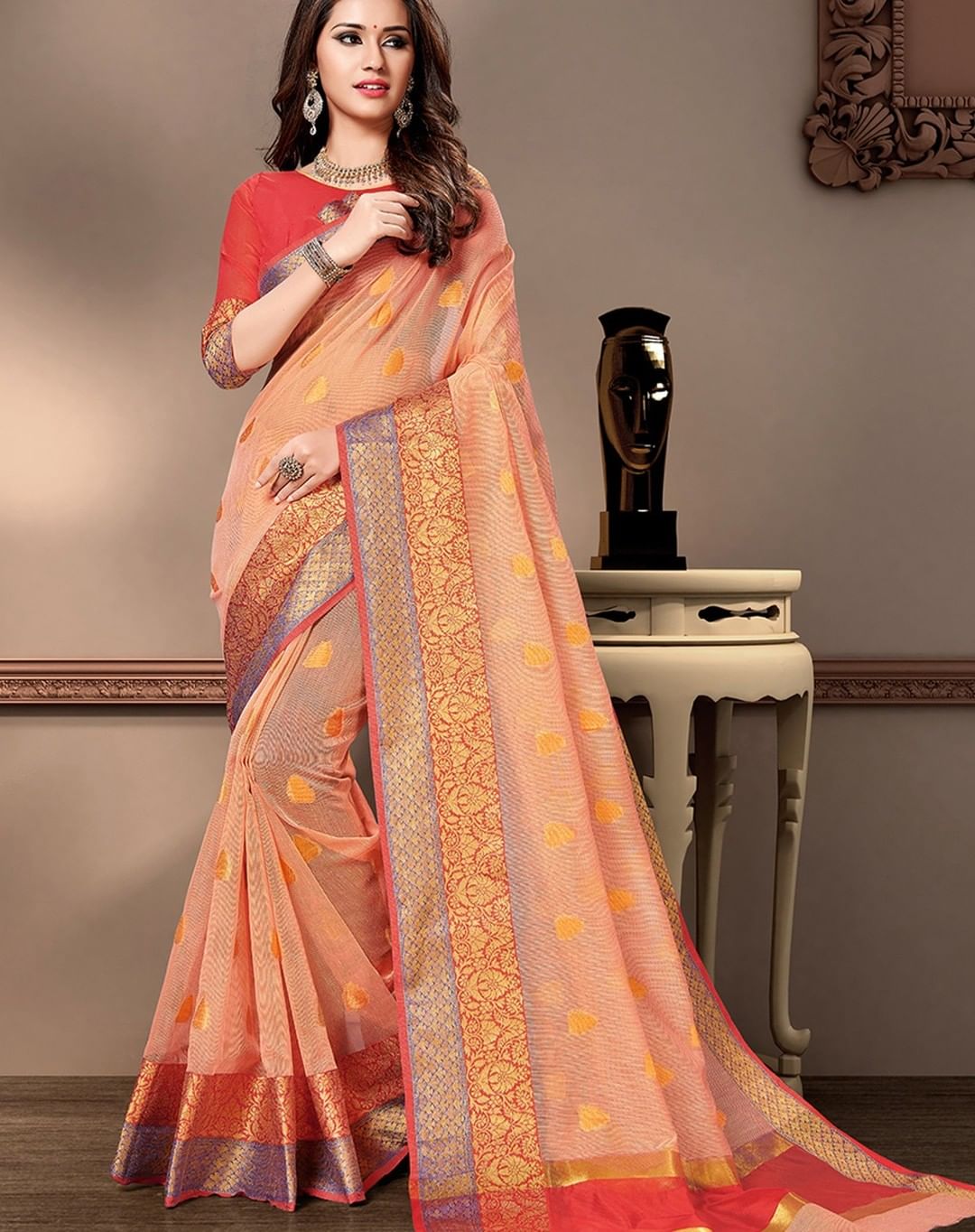 Graceful Peach and Gold Silk Saree with Intricate Border