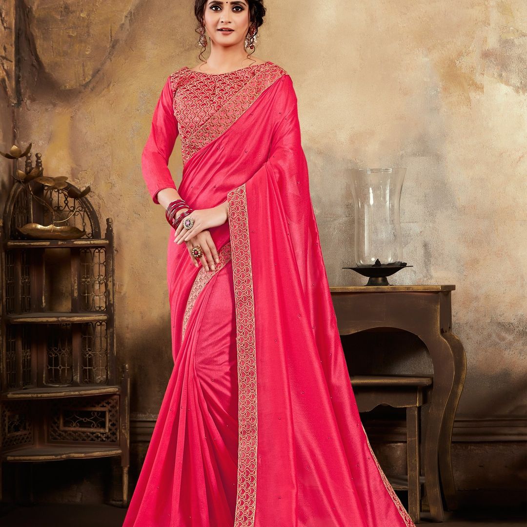 Elegant Pink Silk Saree with Intricate Gold Border