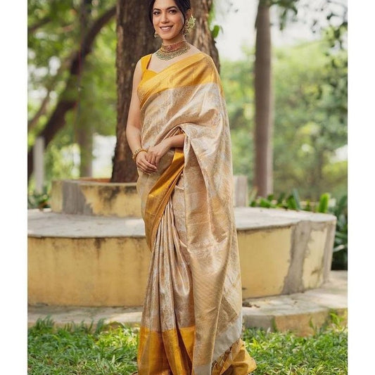 Regal Gold and Silver Silk Saree with Intricate Design