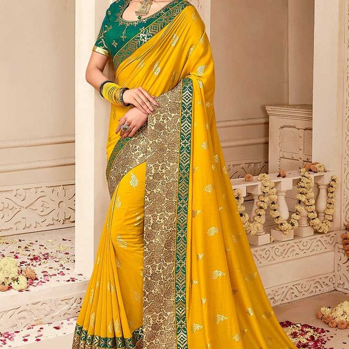 Radiant Yellow and Green Silk Saree with Intricate Gold Detailing